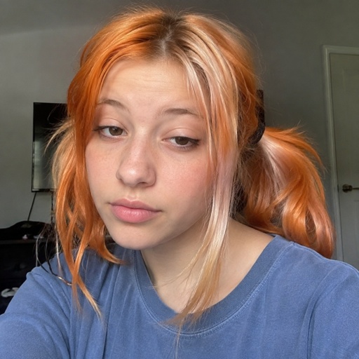Female, orange and white messy pigtails, short, wears blue, droopy eyelid