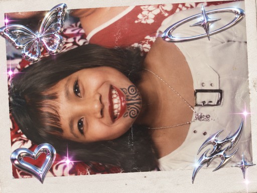 A smiling person in a patterned top with heart and butterfly decorations, glossy photo style.